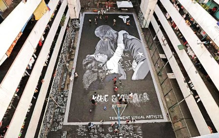 C:\Users\damaris\Downloads\good news\giant mural of Kobe Bryant and his daughter.jpg